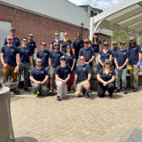 HEB staff volunteering.